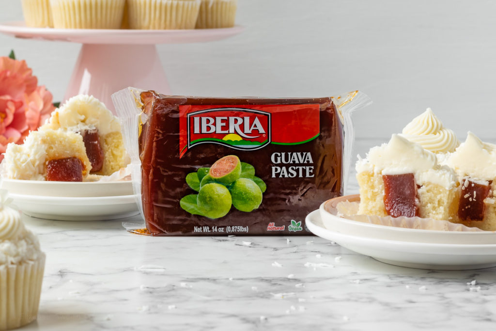Block of Iberia Guava Paste surrounded by cupcakes cut in half.