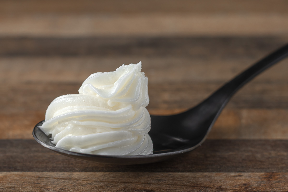 Photo of piped frosting on a spoon