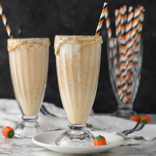 Photo of two milkshakes with Halloween straws