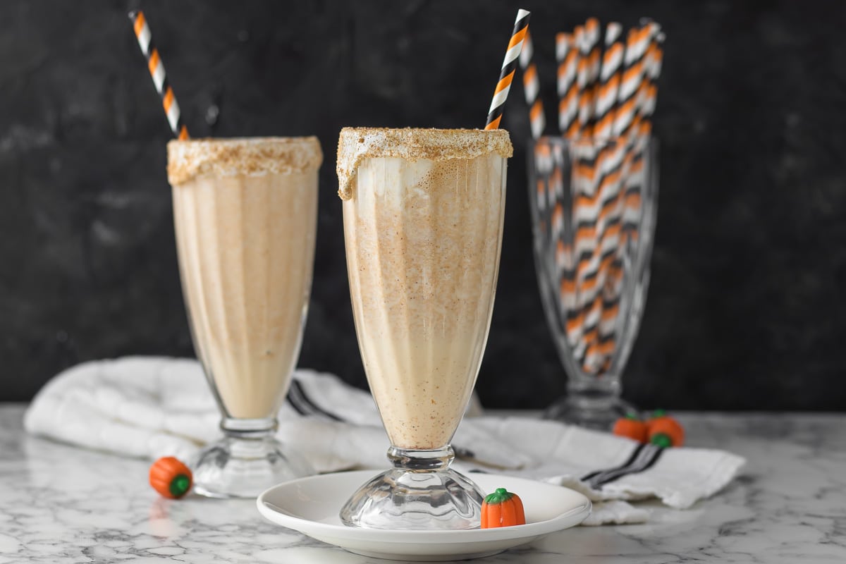 Photo of two milkshakes with Halloween straws