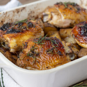 Rosemary Thyme Chicken Thighs in a baking dish right out of the oven.