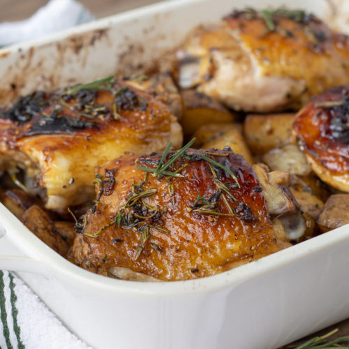 Rosemary and Thyme Chicken Thighs with Roasted Potatoes baked and finished