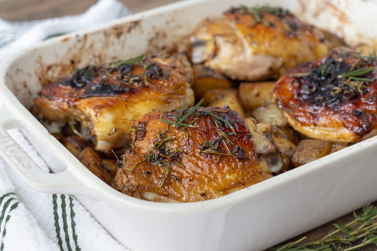 Rosemary and Thyme Chicken Thighs with Roasted Potatoes baked and finished