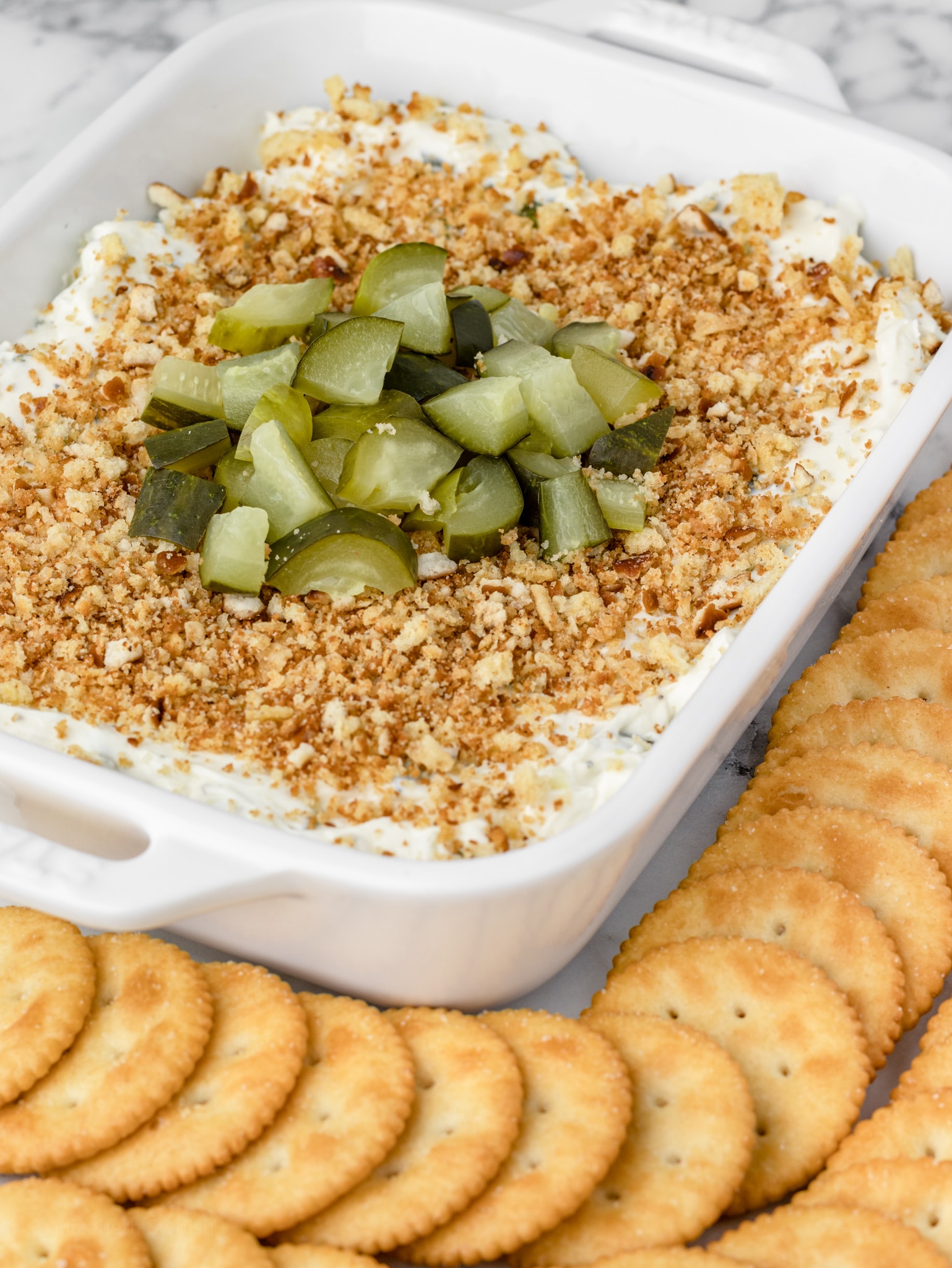 Fried dill pickle dip in a serving dish