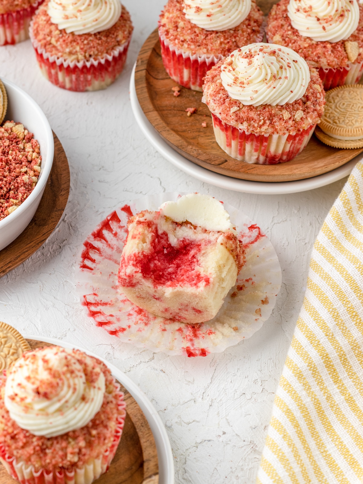 A bite out of a Strawberry Crunch Cupcakes