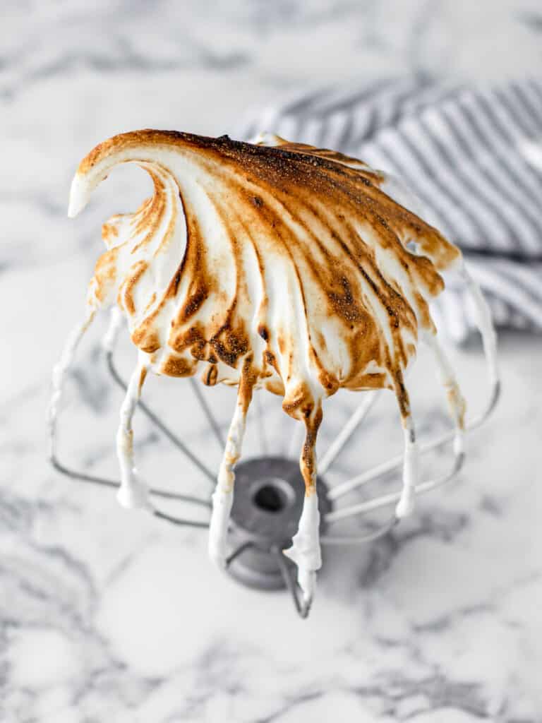 No Fail Italian Meringue on a wire whisk and toasted to perfection.