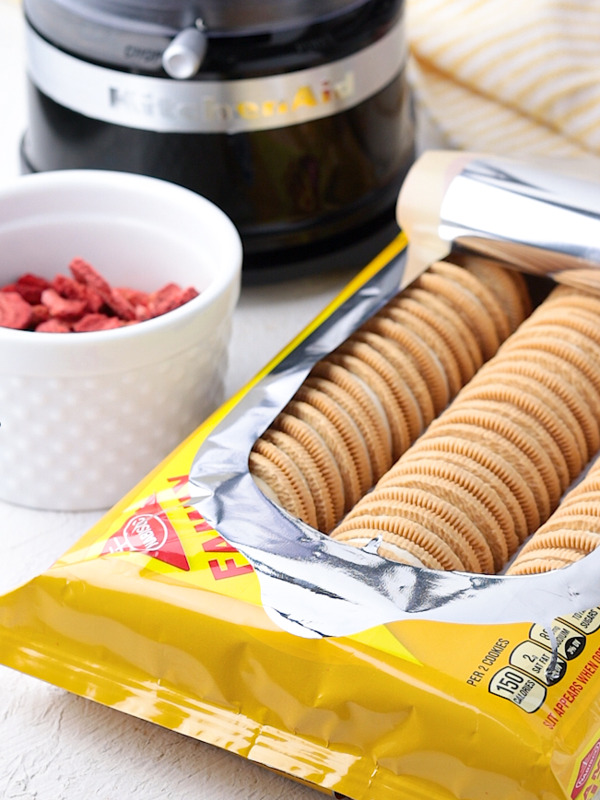 Ingredients for Strawberry Crunch Topping: Golden Oreos, freeze-dried strawberries, and butter.