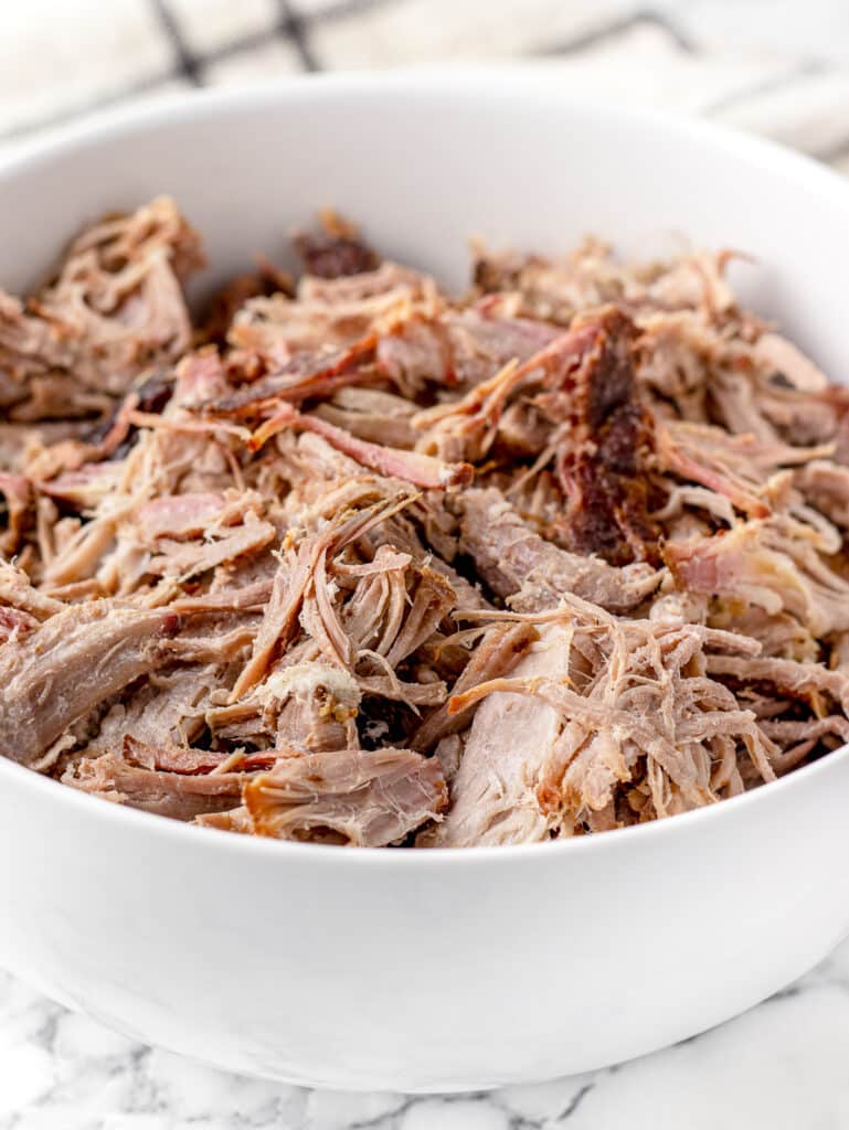 Bowl of smoked pork butt shredded.