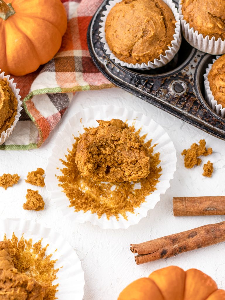 Half eaten 3 ingredient pumpkin muffins.