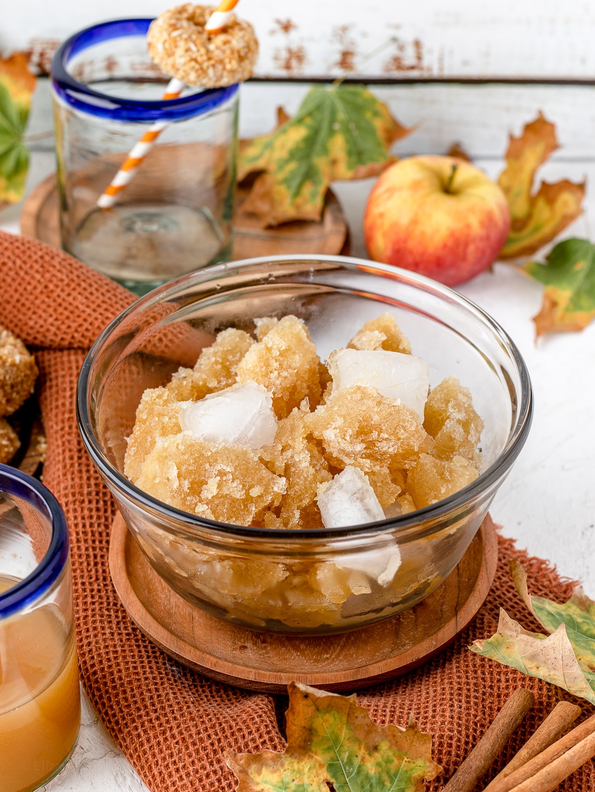 Frozen apple cider chunks and ice in a bowl.