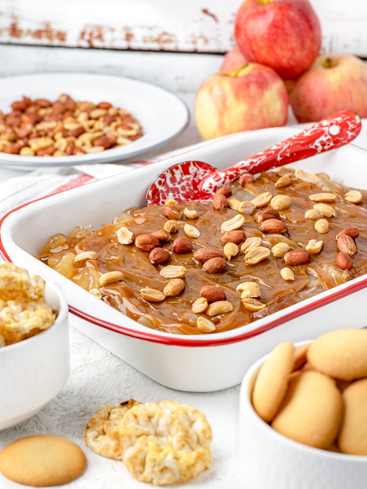 Caramel Apple Pie Dip served with nilla wafers, mini rice cakes, and apples.