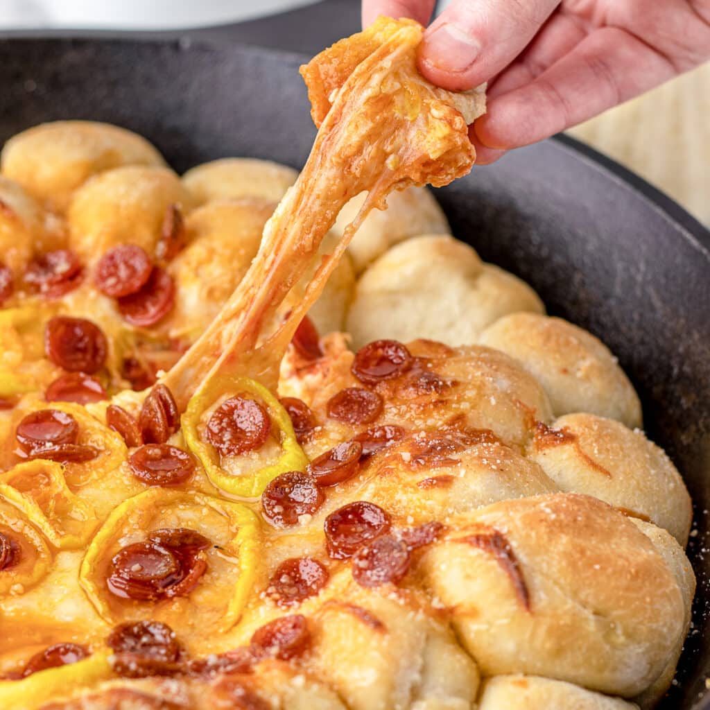 Cheese pull from the Pizza Dip with Pizza Dough Balls.