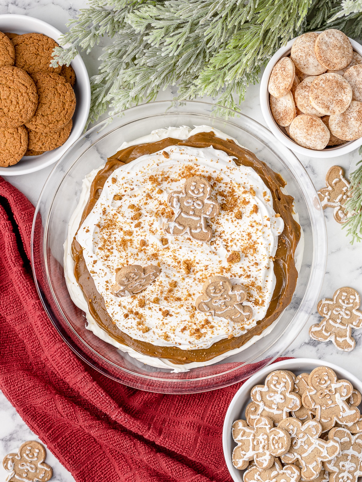 Overhead image of pie dip with dippers- gingersnaps, pie crust chips, and gingerbread cookies