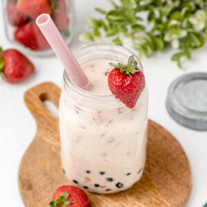 Strawberry Milk Tea with boba and fresh strawberries
