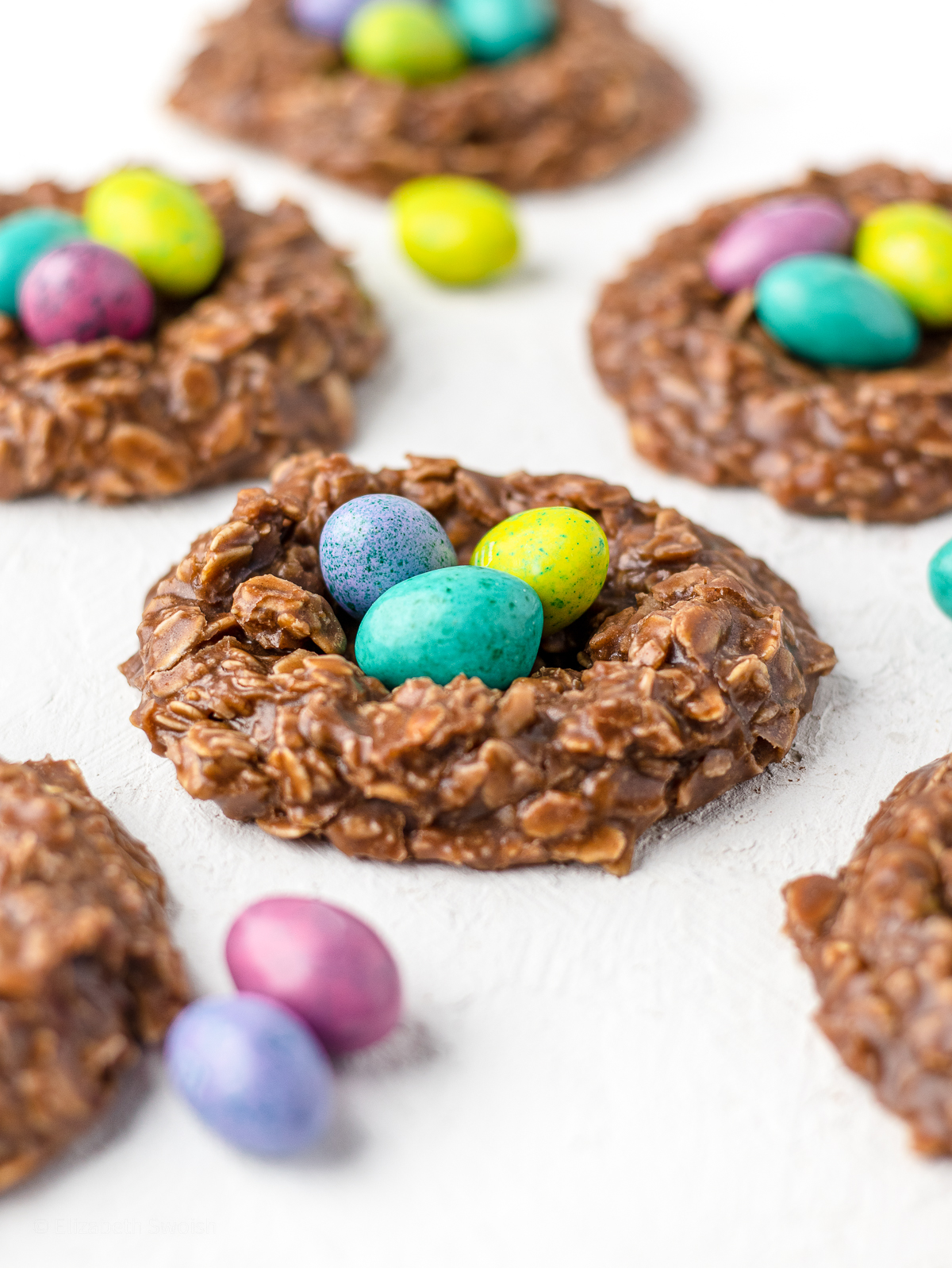 No bake birds nest cookies with 3 candy eggs in them.