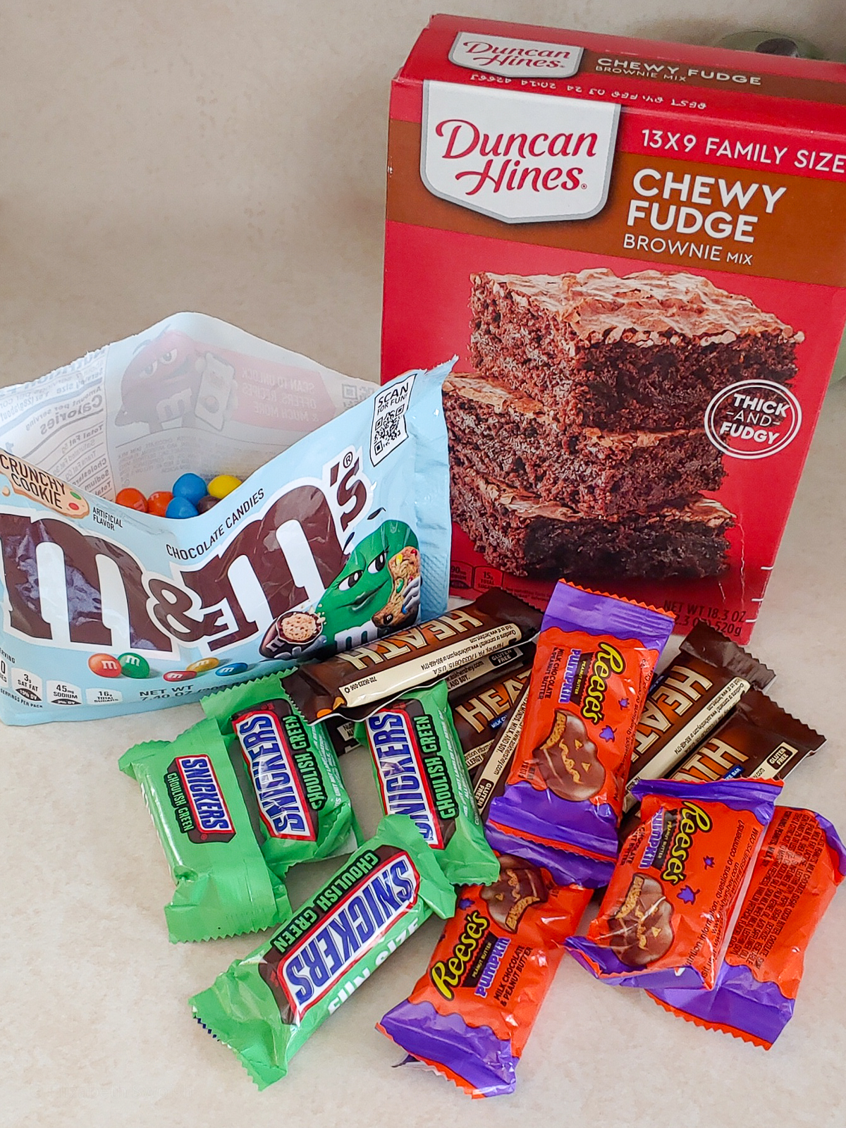 Ingredients. Boxed brownie mix and leftover Halloween candy.