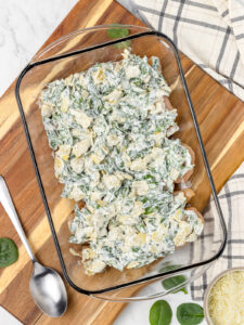 Step 4. Top the chicken breast with the creamy spinach and artichoke mixture.