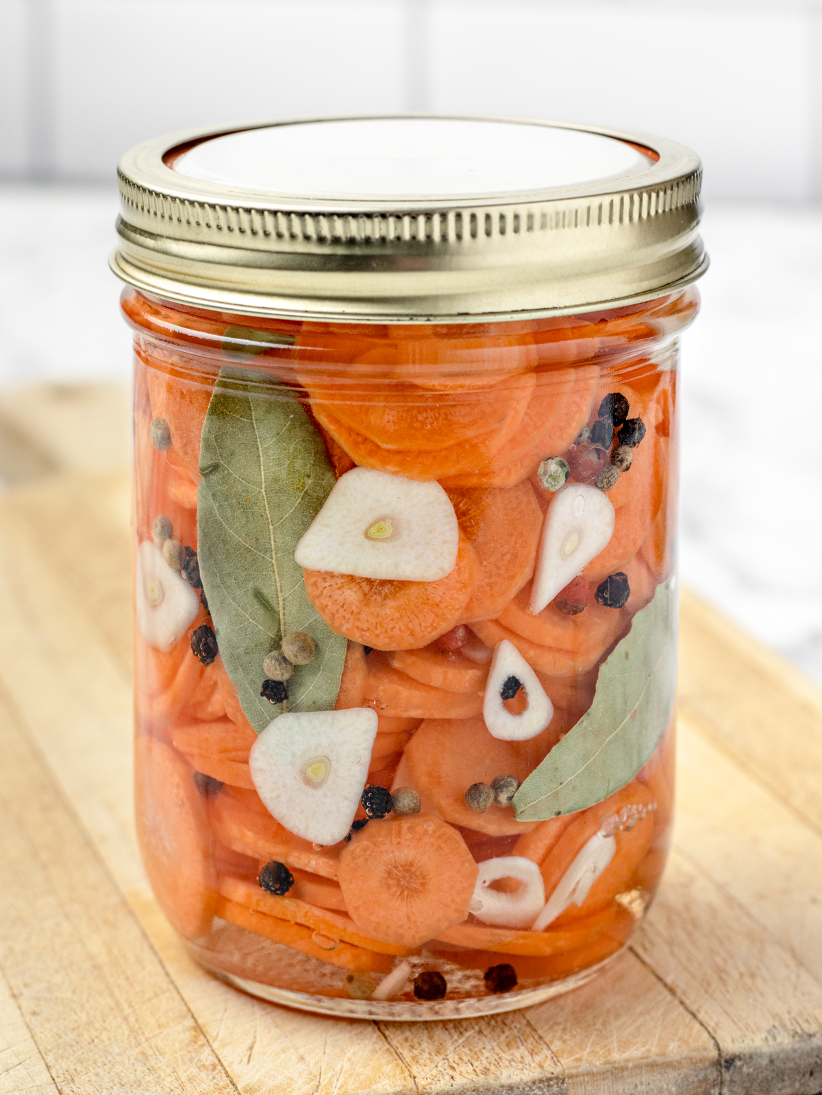 Quick Pickled Carrots in a jar ready to go in the refrigerator.