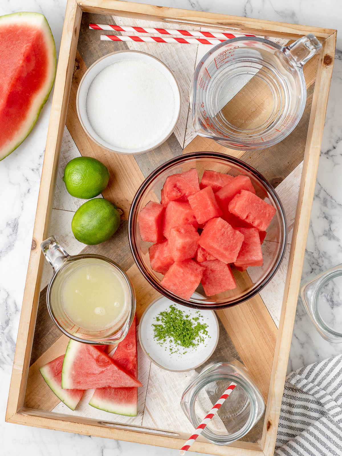 Ingredients needed. Cubed watermelon, lime juice, water, granulated sugar, and lime zest.