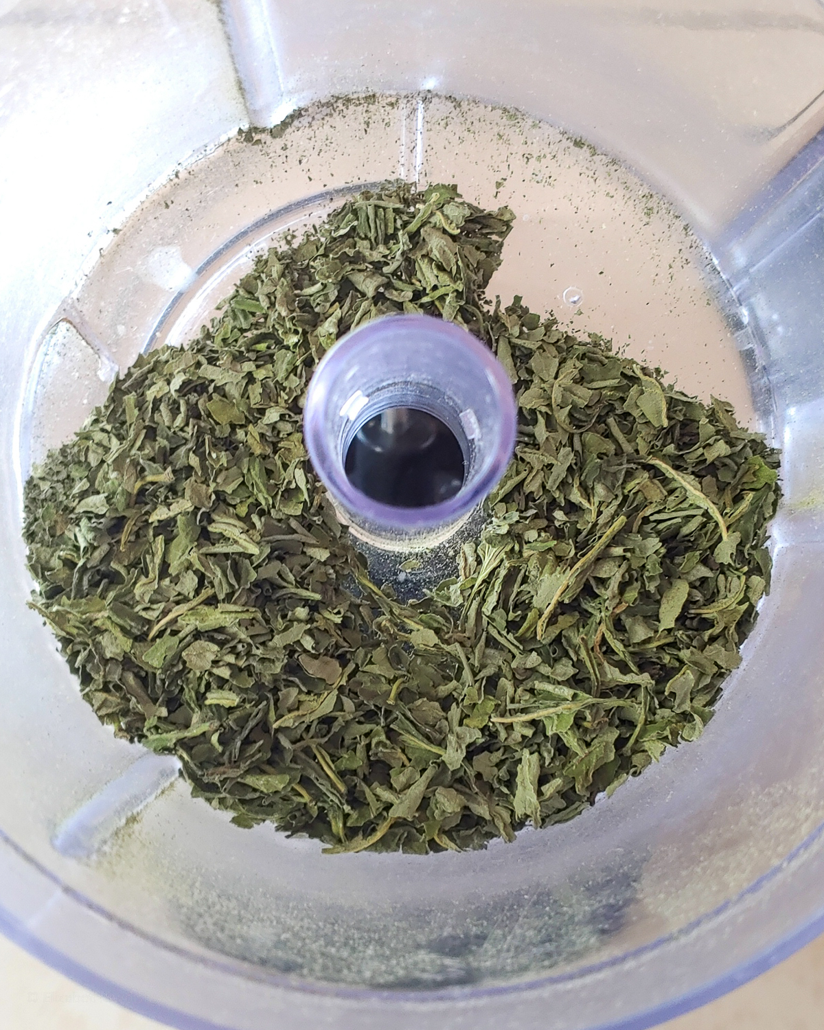 Dried herbs broken down by the food processor. It is ready to be placed in an airtight jar.