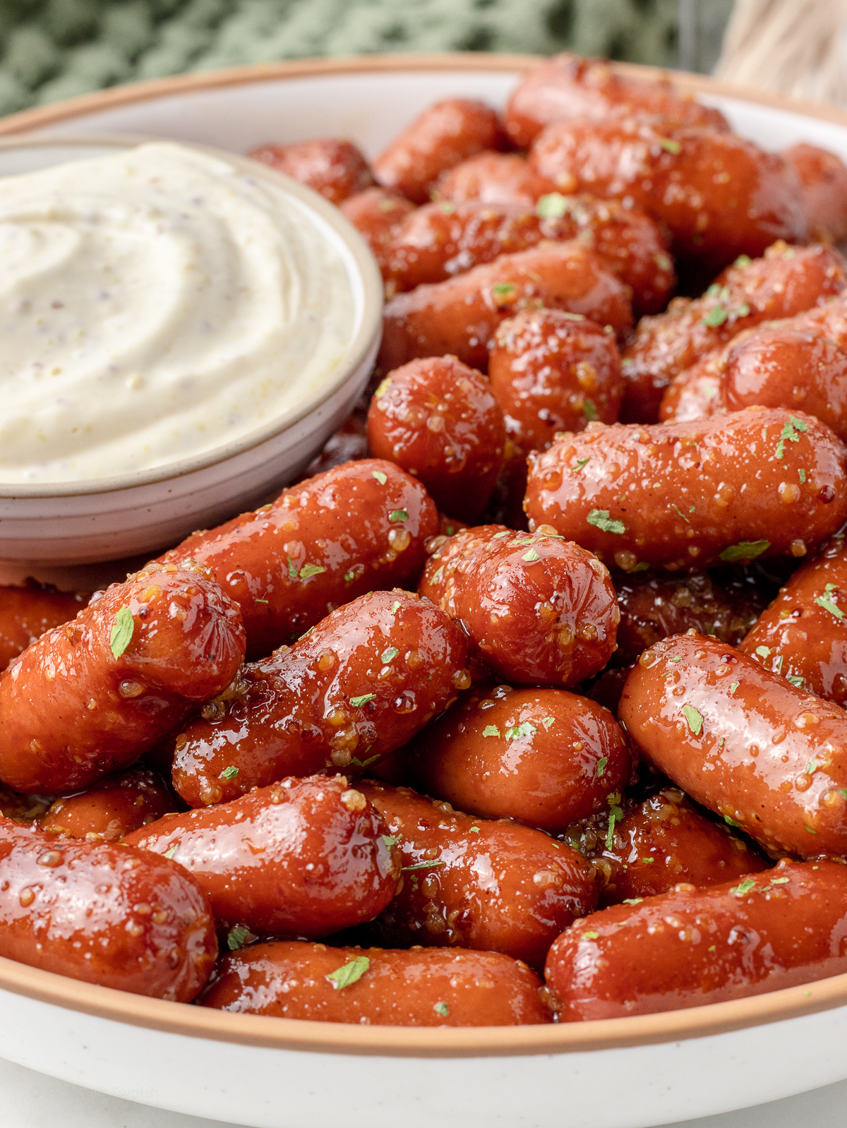 Honey Mustard Sausages with parsley and a dijon mayo dipping sauce.