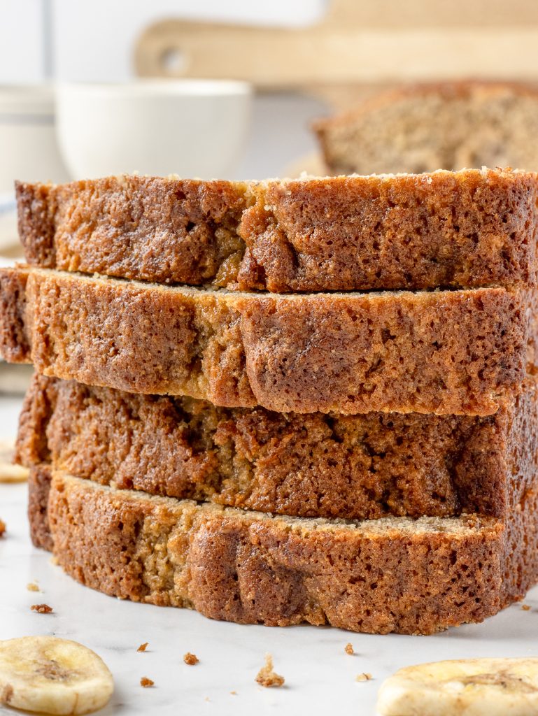 Stack of 4 thick slices of the banana bread.