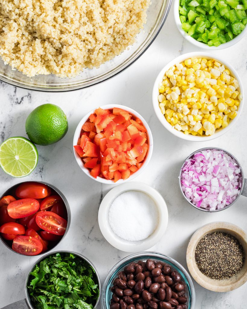 Ingredients needed for this salad. Quinoa, vegetables, black beans, cilantro, and a lime dressing.